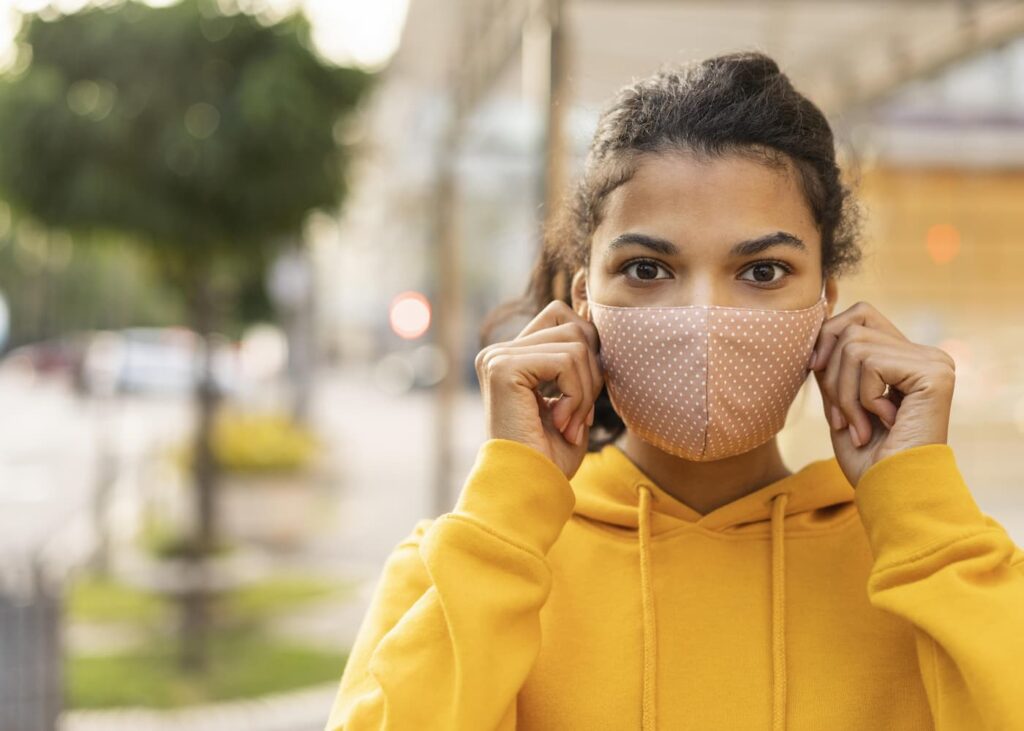 woman-with-face-mask-and-social-distance-concept (1)